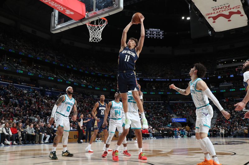 NEW ORLEANS, LA - JANUARY 17: Dyson Daniels #11 of the New Orleans Pelicans shoots the ball during the game against the Charlotte Hornets on January 17, 2024 at the Smoothie King Center in New Orleans, Louisiana. NOTE TO USER: User expressly acknowledges and agrees that, by downloading and or using this Photograph, user is consenting to the terms and conditions of the Getty Images License Agreement. Mandatory Copyright Notice: Copyright 2024 NBAE (Photo by Layne Murdoch Jr./NBAE via Getty Images)