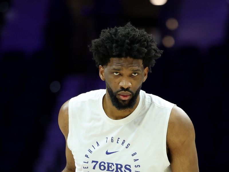 PHILADELPHIA, PENNSYLVANIA - DECEMBER 13: Joel Embiid #21 of the Philadelphia 76ers warms up before a game against the Indiana Pacers at the Wells Fargo Center on December 13, 2024 in Philadelphia, Pennsylvania. NOTE TO USER: User expressly acknowledges and agrees that, by downloading and or using this photograph, User is consenting to the terms and conditions of the Getty Images License Agreement. (Photo by Emilee Chinn/Getty Images)