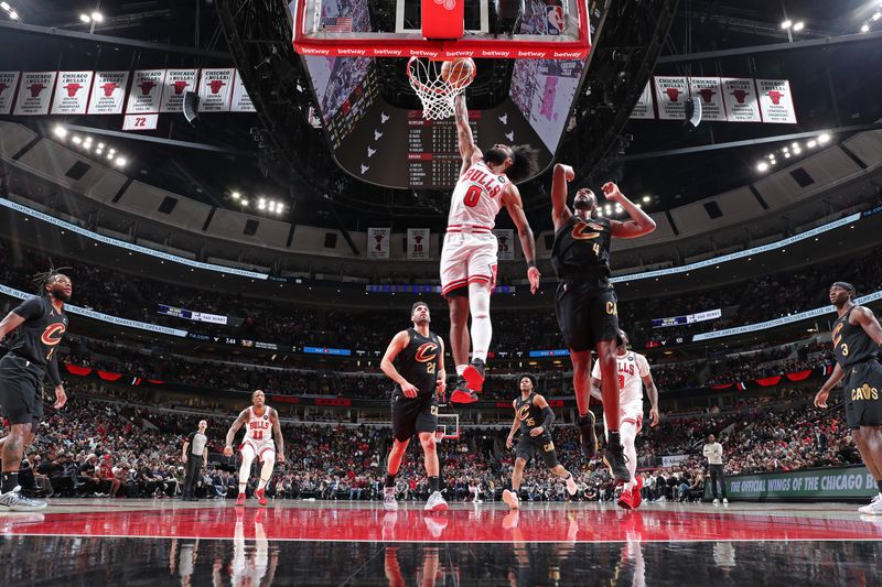 CHICAGO, IL - FEBRUARY 28: Coby White #0 of the Chicago Bulls dunks the ball during the game against the Cleveland Cavaliers on February 28, 2024 at United Center in Chicago, Illinois. NOTE TO USER: User expressly acknowledges and agrees that, by downloading and or using this photograph, User is consenting to the terms and conditions of the Getty Images License Agreement. Mandatory Copyright Notice: Copyright 2024 NBAE (Photo by Jeff Haynes/NBAE via Getty Images)