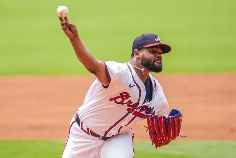 Jun 19, 2024; Cumberland, Georgia, USA; Atlanta Braves starting pitcher Reynaldo Lopez (40) pitches against the Detroit Tigers during the first inning  at Truist Park. Mandatory Credit: Dale Zanine-USA TODAY Sports