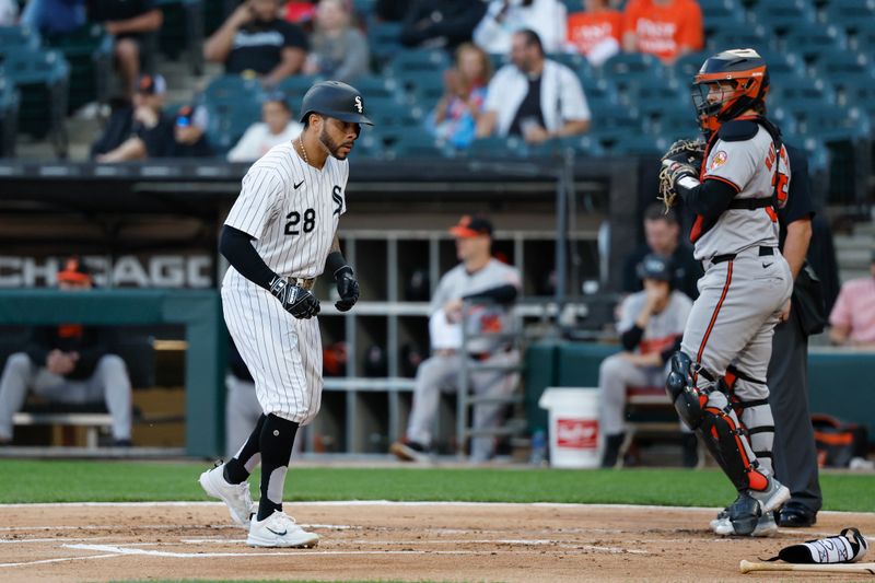 May 23, 2024; Chicago, Illinois, USA; Chicago White Sox outfielder Tommy Pham (28) scores against the Baltimore Orioles during the first inning at Guaranteed Rate Field. Mandatory Credit: Kamil Krzaczynski-USA TODAY Sports