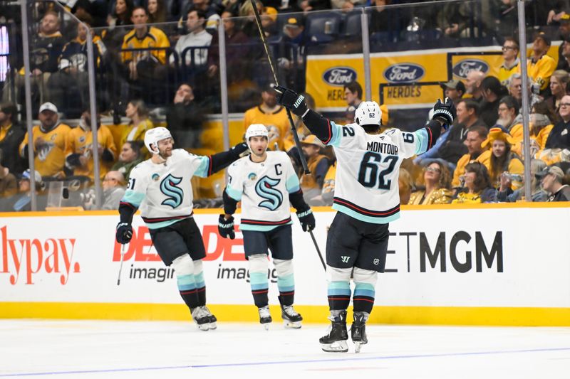 Oct 15, 2024; Nashville, Tennessee, USA; Seattle Kraken right wing Jordan Eberle (7) celebrates his goal with his teammates against the Nashville Predators  during the third period at Bridgestone Arena. Mandatory Credit: Steve Roberts-Imagn Images