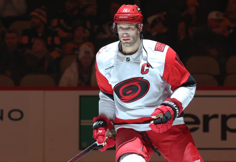 Dec 30, 2025; Pittsburgh, Pennsylvania, USA; Carolina Hurricanes center Jordan Staal (11) during player introductions against the Pittsburgh Penguins before the first period at PPG Paints Arena. Mandatory Credit: Charles LeClaire-Imagn Images