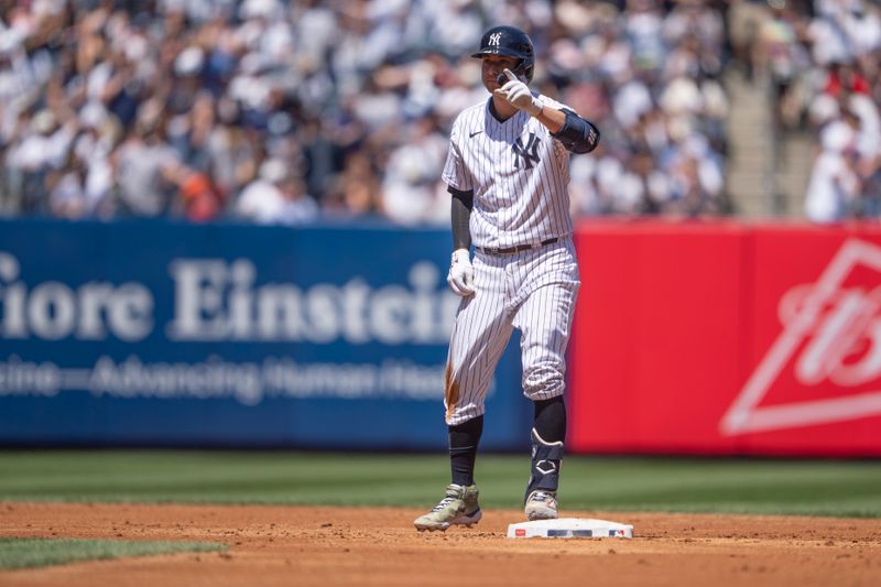 May 28, 2023; Bronx, New York, USA; New York Yankees catcher Kyle Higashioka (66) reacts to hitting a double against the San Diego Padres during the third inning at Yankee Stadium. Mandatory Credit: Gregory Fisher-USA TODAY Sports