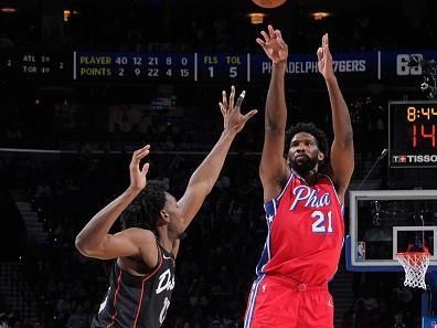 PHILADELPHIA, PA - DECEMBER 15: Joel Embiid #21 of the Philadelphia 76ers shoots a three point basket against the Detroit Pistons on December 15, 2023 at the Wells Fargo Center in Philadelphia, Pennsylvania NOTE TO USER: User expressly acknowledges and agrees that, by downloading and/or using this Photograph, user is consenting to the terms and conditions of the Getty Images License Agreement. Mandatory Copyright Notice: Copyright 2023 NBAE (Photo by Jesse D. Garrabrant/NBAE via Getty Images)