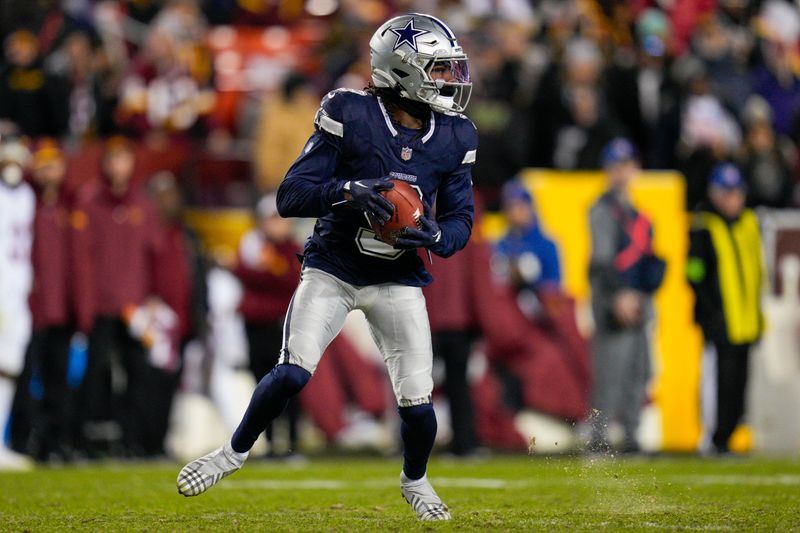 Dallas Cowboys wide receiver KaVontae Turpin receives a kick from the Washington Commanders during the second half, Sunday, January 7, 2024, in Landover, Md. Dallas won 38-10. (AP Photo/Jess Rapfogel)