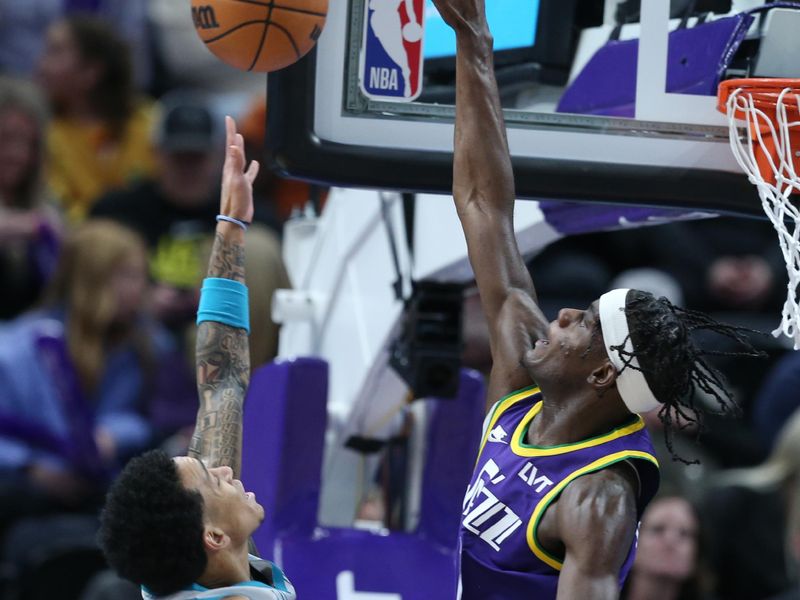 SALT LAKE CITY, UT - FEBRUARY 22: Taylor Hendricks #0 of the Utah Jazz blocks a shot by Tre Mann #23 of the Charlotte Hornets during the first half of their game at the Delta Center on February 22, 2024 in Salt Lake City, Utah.  NOTE TO USER: User expressly acknowledges and agrees that, by downloading and or using this Photograph, User is concenting to the terms and conditions of the Getty Images license Agreement. (Photo by Chris Gardner/Getty Images)