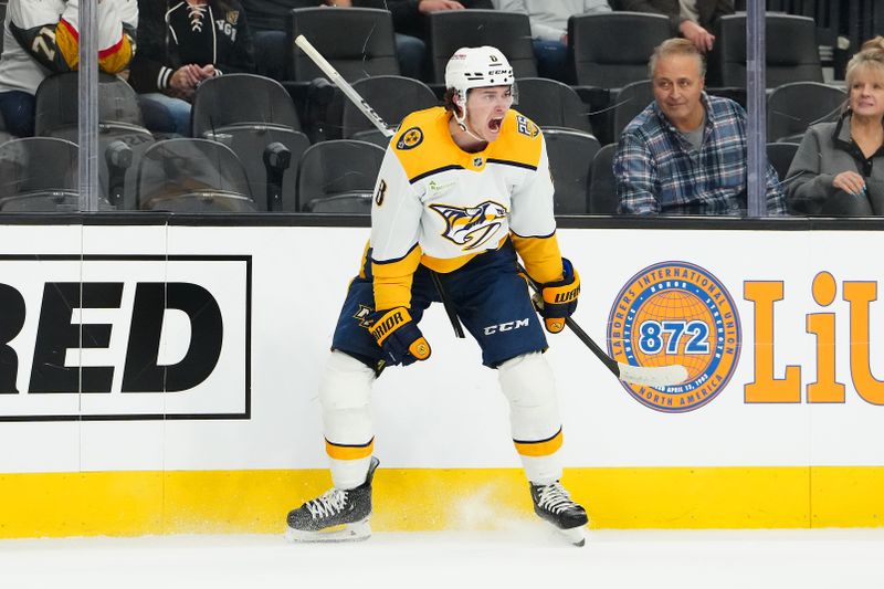 Feb 20, 2024; Las Vegas, Nevada, USA; Nashville Predators center Cody Glass (8) celebrates after scoring a goal against the Vegas Golden Knights during the first period at T-Mobile Arena. Mandatory Credit: Stephen R. Sylvanie-USA TODAY Sports