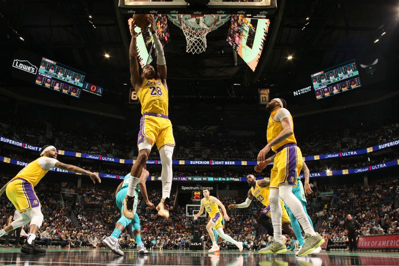 CHARLOTTE, NC - FEBRUARY 5: Rui Hachimura #28 of the Los Angeles Lakers grabs a rebound during the game against the Charlotte Hornets on February 5, 2024 at Spectrum Center in Charlotte, North Carolina. NOTE TO USER: User expressly acknowledges and agrees that, by downloading and or using this photograph, User is consenting to the terms and conditions of the Getty Images License Agreement. Mandatory Copyright Notice: Copyright 2024 NBAE (Photo by Kent Smith/NBAE via Getty Images)