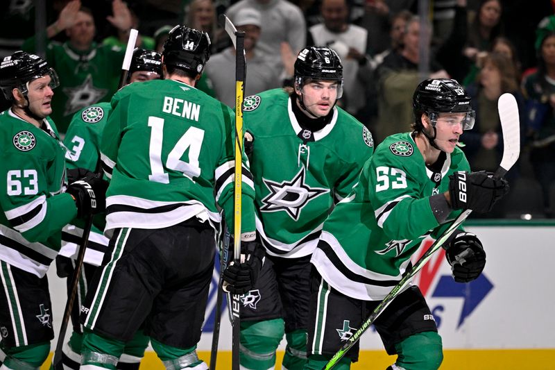 Mar 6, 2025; Dallas, Texas, USA; Dallas Stars center Wyatt Johnston (53) and defenseman Matt Dumba (3) and right wing Evgenii Dadonov (63) and left wing Jamie Benn (14) and defenseman Lian Bichsel (6) skate off the ice after Johnston scores a goal against the Calgary Flames during the second period at the American Airlines Center. Mandatory Credit: Jerome Miron-Imagn Images