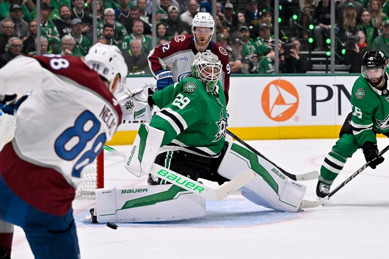 Apr 28, 2025; Dallas, Texas, USA; Dallas Stars goaltender Jake Oettinger (29) stops a shot by Colorado Avalanche center Martin Necas (88) during the first period in game five of the first round of the 2025 Stanley Cup Playoffs at American Airlines Center. Mandatory Credit: Jerome Miron-Imagn Images