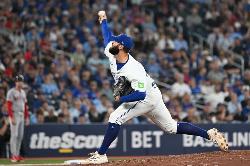 Sep 23, 2025; Toronto, Ontario, CAN;  Toronto Blue Jays relief pitcher Tommy Nance (45) delivers a pitch against the Boston Red Sox in the ninth inning at Rogers Centre. Mandatory Credit: Dan Hamilton-Imagn Images