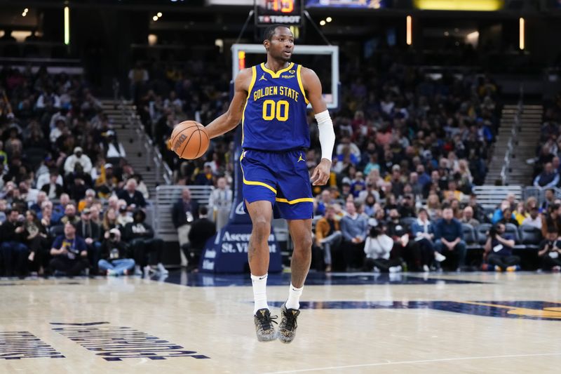 INDIANAPOLIS, INDIANA - FEBRUARY 08: Jonathan Kuminga #00 of the Golden State Warriors dribbles the ball in the third quarter against the Indiana Pacers at Gainbridge Fieldhouse on February 08, 2024 in Indianapolis, Indiana. NOTE TO USER: User expressly acknowledges and agrees that, by downloading and or using this photograph, User is consenting to the terms and conditions of the Getty Images License Agreement. (Photo by Dylan Buell/Getty Images)