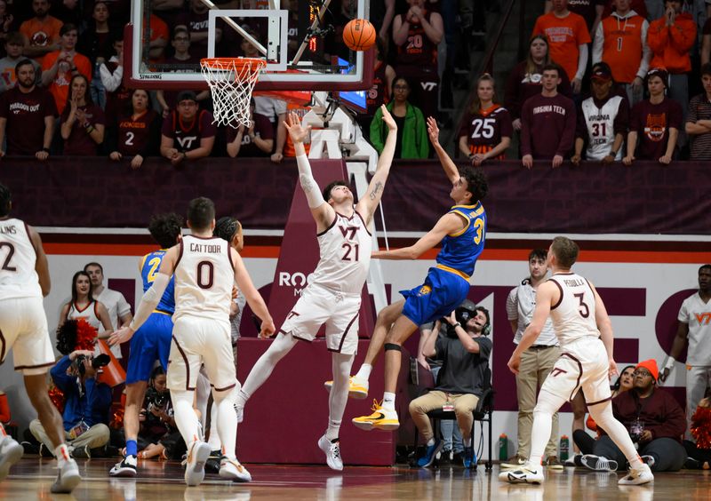 Feb 18, 2023; Blacksburg, Virginia, USA; Pittsburgh Panthers forward Jorge Diaz Graham (31) shoots the ball against Virginia Tech Hokies forward Grant Basile (21) in the second half at Cassell Coliseum. Mandatory Credit: Lee Luther Jr.-USA TODAY Sports