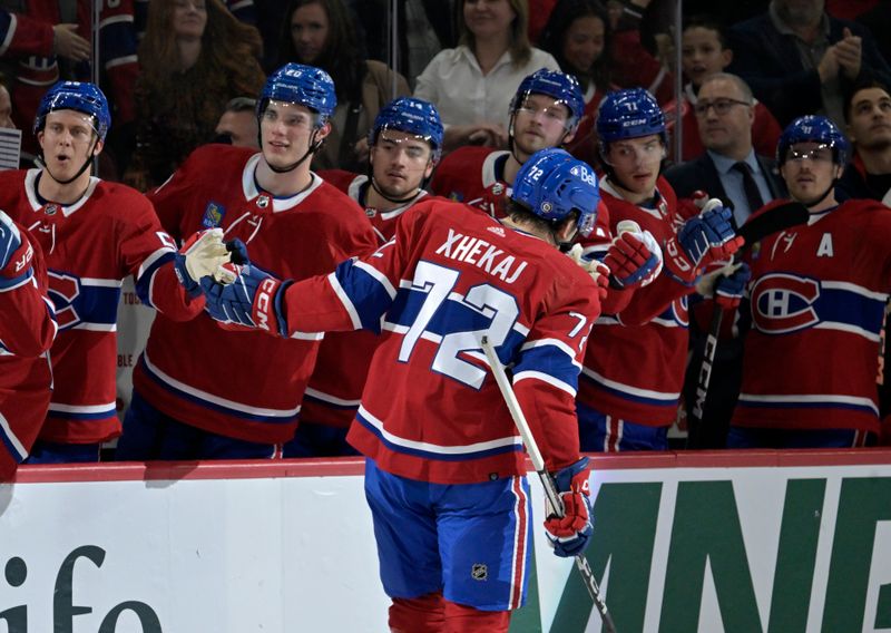 Feb 21, 2024; Montreal, Quebec, CAN; Montreal Canadiens defenseman Arber Xhekaj (72) celebrates with teammates after scoring a goal against the Buffalo Sabres during the first period at the Bell Centre. Mandatory Credit: Eric Bolte-USA TODAY Sports