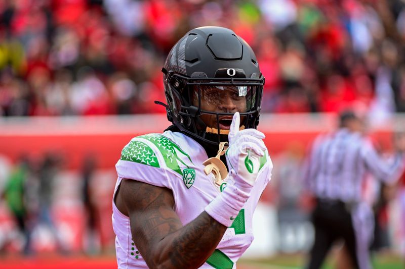 Oct 28, 2023; Salt Lake City, Utah, USA; Oregon Ducks wide receiver Traeshon Holden (5) reacts after a touchdown against the Utah Utes during the first half at Rice-Eccles Stadium. Mandatory Credit: Christopher Creveling-USA TODAY Sports