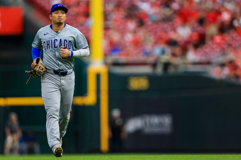 Jul 29, 2024; Cincinnati, Ohio, USA; Cincinnati Reds outfielder Jake Fraley (27) runs off the field at the end of the second inning in the game against the Cincinnati Reds at Great American Ball Park. Mandatory Credit: Katie Stratman-USA TODAY Sports