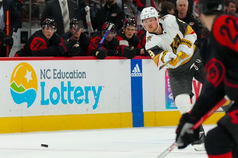 Mar 11, 2023; Raleigh, North Carolina, USA;  Vegas Golden Knights center Jack Eichel (9) takes a shot against the Carolina Hurricanes during the second period at PNC Arena. Mandatory Credit: James Guillory-USA TODAY Sports