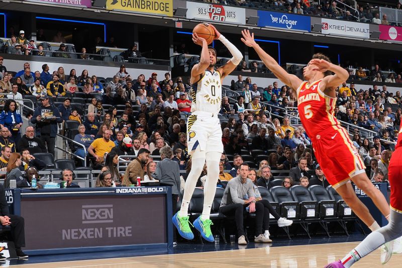 INDIANAPOLIS, IN - FEBRUARY 1: Tyrese Haliburton #0 of the Indiana Pacers shoots a three point basket during the game against the Atlanta Hawks on February 1, 2025 at Gainbridge Fieldhouse in Indianapolis, Indiana. NOTE TO USER: User expressly acknowledges and agrees that, by downloading and or using this Photograph, user is consenting to the terms and conditions of the Getty Images License Agreement. Mandatory Copyright Notice: Copyright 2025 NBAE (Photo by Ron Hoskins/NBAE via Getty Images)