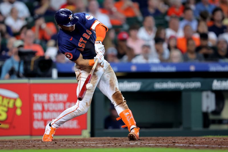 Jul 30, 2023; Houston, Texas, USA; Houston Astros shortstop Jeremy Pena (3) hits a single against the Tampa Bay Rays during the fifth inning at Minute Maid Park. Mandatory Credit: Erik Williams-USA TODAY Sports