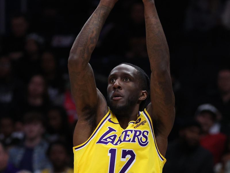 WASHINGTON, DC - APRIL 03: Taurean Prince #12 of the Los Angeles Lakers shoots against the Washington Wizards during the first half at Capital One Arena on April 03, 2024 in Washington, DC. NOTE TO USER: User expressly acknowledges and agrees that, by downloading and or using this photograph, User is consenting to the terms and conditions of the Getty Images License Agreement. (Photo by Patrick Smith/Getty Images)