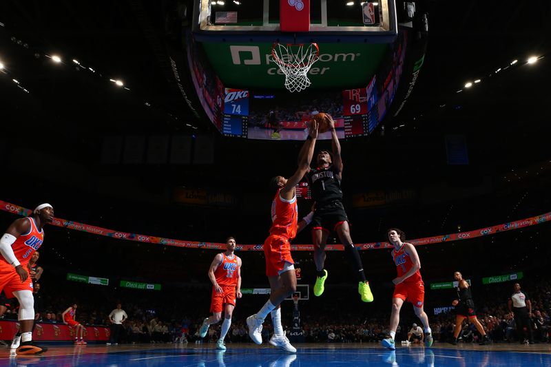 OKLAHOMA CITY, OK - MARCH 27:  Amen Thompson #1 of the Houston Rockets drives to the basket during the game against the Oklahoma City Thunder on March 27, 2024 at Paycom Arena in Oklahoma City, Oklahoma. NOTE TO USER: User expressly acknowledges and agrees that, by downloading and or using this photograph, User is consenting to the terms and conditions of the Getty Images License Agreement. Mandatory Copyright Notice: Copyright 2024 NBAE (Photo by Zach Beeker/NBAE via Getty Images)