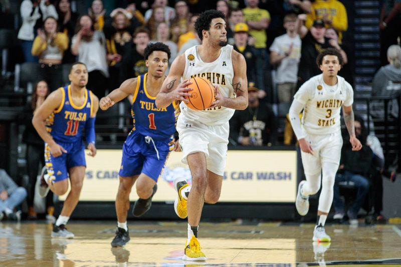 Jan 14, 2023; Wichita, Kansas, USA; Wichita State Shockers forward Kenny Pohto (11) brings the ball up court during the second half against the Wichita State Shockers at Charles Koch Arena. Mandatory Credit: William Purnell-USA TODAY Sports