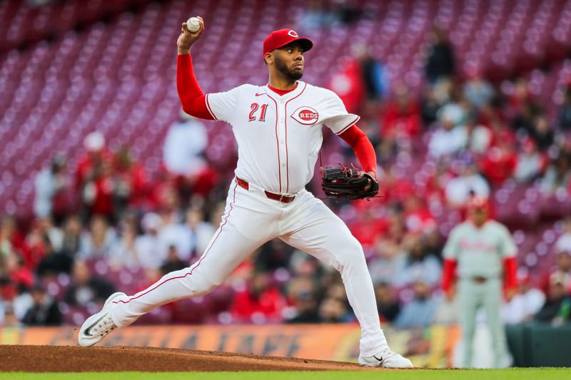 Apr 22, 2024; Cincinnati, Ohio, USA; Cincinnati Reds starting pitcher Hunter Greene (21) pitches against the Philadelphia Phillies in the first inning at Great American Ball Park. Mandatory Credit: Katie Stratman-USA TODAY Sports