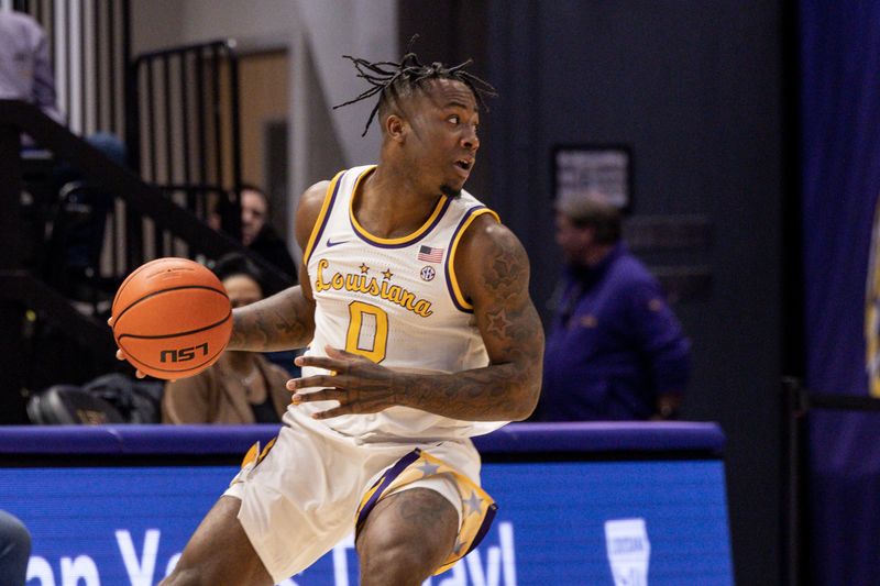 Feb 18, 2023; Baton Rouge, Louisiana, USA; LSU Tigers guard Trae Hannibal (0) dribbles against the South Carolina Gamecocks during the second half at Pete Maravich Assembly Center. Mandatory Credit: Stephen Lew-USA TODAY Sports