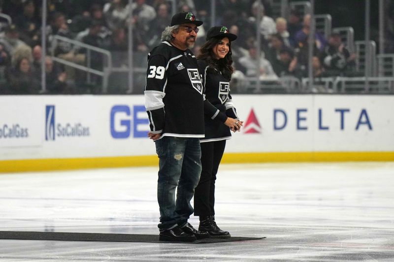 Apr 13, 2024; Los Angeles, California, USA; George Lopez (left) and daughter Mayan Lopez attend the game between the LA Kings and the Anaheim Ducks at Crypto.com Arena. Mandatory Credit: Kirby Lee-USA TODAY Sports