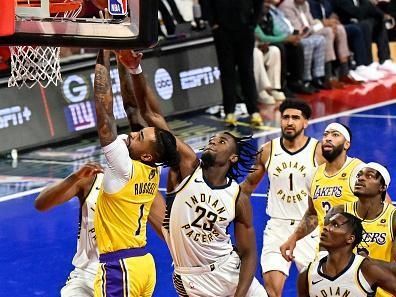 LAS VEGAS, NV - DECEMBER 9:   D'Angelo Russell #1 of the Los Angeles Lakers drives to the basket during the game as Aaron Nesmith #23 of the Indiana Pacers plays defense during the In-Season Tournament Championship game on December 9, 2023 at T-Mobile Arena in Las Vegas, Nevada. NOTE TO USER: User expressly acknowledges and agrees that, by downloading and or using this photograph, User is consenting to the terms and conditions of the Getty Images License Agreement. Mandatory Copyright Notice: Copyright 2023 NBAE (Photo by David Becker/NBAE via Getty Images)