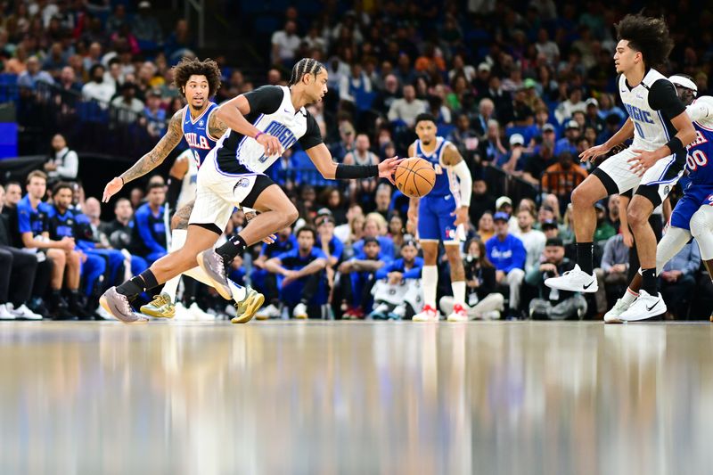 ORLANDO, FLORIDA - OCTOBER 18: Jett Howard #13 of the Orlando Magic drives to the basket in the first half of a game against the Philadelphia 76ers at Kia Center on October 18, 2024 in Orlando, Florida. NOTE TO USER: User expressly acknowledges and agrees that, by downloading and or using this photograph, User is consenting to the terms and conditions of the Getty Images License Agreement. (Photo by Julio Aguilar/Getty Images)