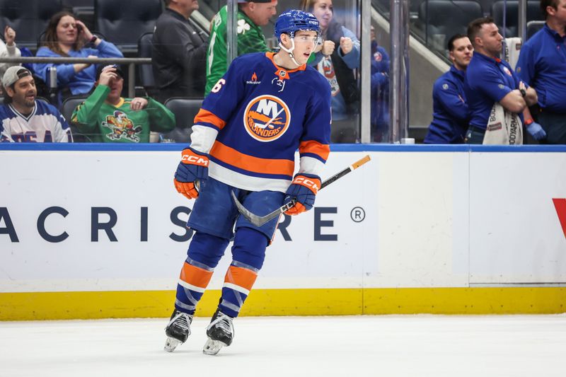 Mar 16, 2025; Elmont, New York, USA;  New York Islanders center Marc Gatcomb (16) circles back to center ice after scoring a goal in the third period against the Florida Panthers at UBS Arena. Mandatory Credit: Wendell Cruz-Imagn Images