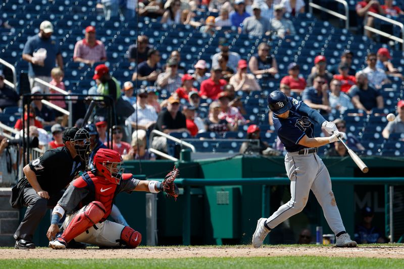 Apr 5, 2023; Washington, District of Columbia, USA; Tampa Bay Rays third baseman Taylor Walls (6) hits an RBI double against the Washington Nationals during the sixth inning at Nationals Park. Mandatory Credit: Geoff Burke-USA TODAY Sports