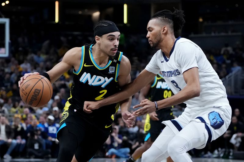 INDIANAPOLIS, INDIANA - JANUARY 28: Andrew Nembhard #2 of the Indiana Pacers dribbles the ball while being guarded by Ziaire Williams #8 of the Memphis Grizzlies in the first quarter at Gainbridge Fieldhouse on January 28, 2024 in Indianapolis, Indiana. NOTE TO USER: User expressly acknowledges and agrees that, by downloading and or using this photograph, User is consenting to the terms and conditions of the Getty Images License Agreement. (Photo by Dylan Buell/Getty Images)