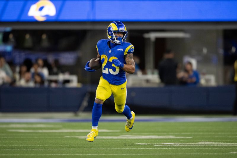 Los Angeles Rams running back Kyren Williams (23) runs with the ball during an NFL football game against the New Orleans Saints, Thursday, Dec. 21, 2023, in Inglewood, Calif. (AP Photo/Kyusung Gong)