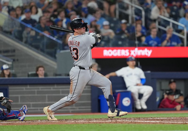 May 18, 2025; Toronto, Ontario, CAN; Detroit Tigers catcher Dillon Dingler (13) hits a single against the Toronto Blue Jays during the sixth inning at Rogers Centre. Mandatory Credit: Nick Turchiaro-Imagn Images