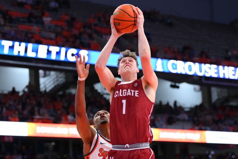 Nov 14, 2023; Syracuse, New York, USA; Colgate Raiders guard Brady Cummins (1) shoots the ball against the defense of Syracuse Orange guard JJ Starling (2) during the first half at the JMA Wireless Dome. Mandatory Credit: Rich Barnes-USA TODAY Sports