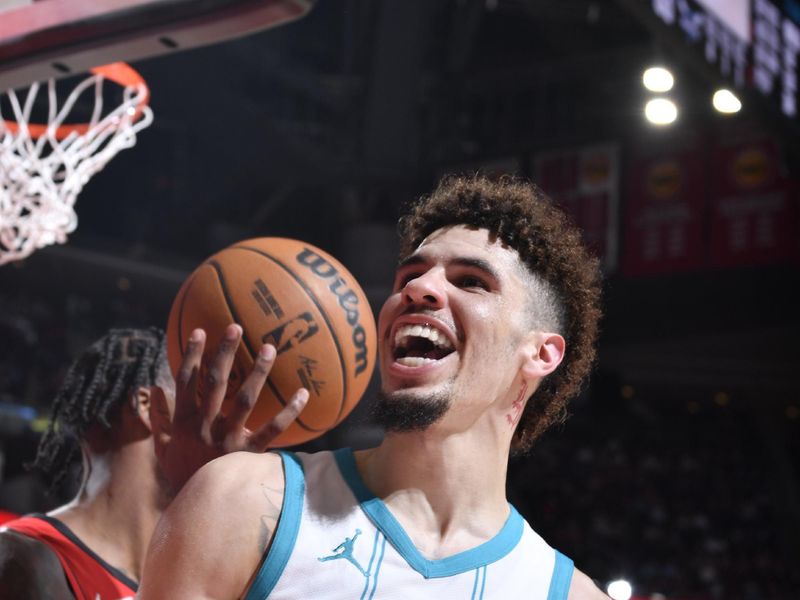 HOUSTON, TX - OCTOBER 23:  LaMelo Ball #1 of the Charlotte Hornets celebrates during the game against the Houston Rockets  during a regular season game on October 23, 2024 at the Toyota Center in Houston, Texas. NOTE TO USER: User expressly acknowledges and agrees that, by downloading and or using this photograph, User is consenting to the terms and conditions of the Getty Images License Agreement. Mandatory Copyright Notice: Copyright 2024 NBAE (Photo by Logan Riely/NBAE via Getty Images)