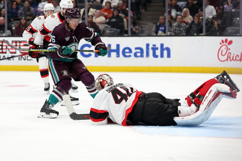 Mar 6, 2024; Anaheim, California, USA;  Ottawa Senators goaltender Mads Sogaard (40) makes a save against Anaheim Ducks center Ryan Strome (16) during the second period at Honda Center. Mandatory Credit: Kiyoshi Mio-USA TODAY Sports