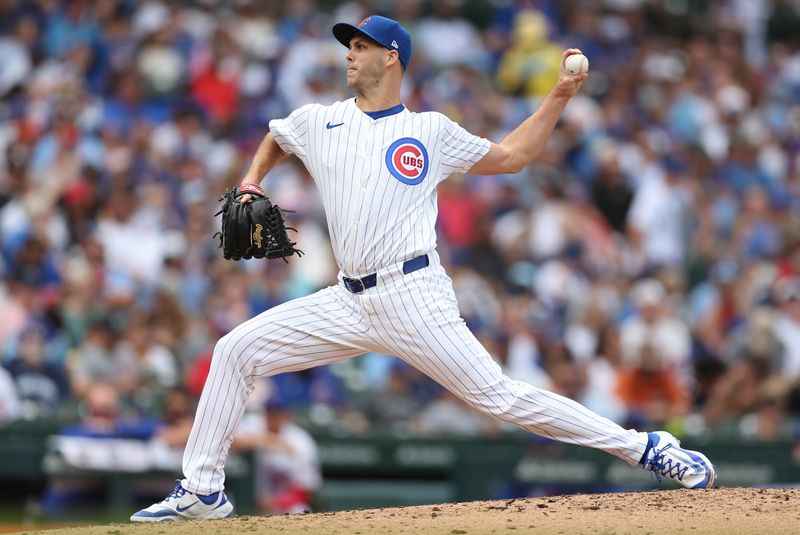 Aug 17, 2025; Chicago, Illinois, USA;  Chicago Cubs pitcher Taylor Rogers (17) delivers a pitch during the fifth inning against the Pittsburgh Pirates at Wrigley Field. Mandatory Credit: Melissa Tamez-Imagn Images
