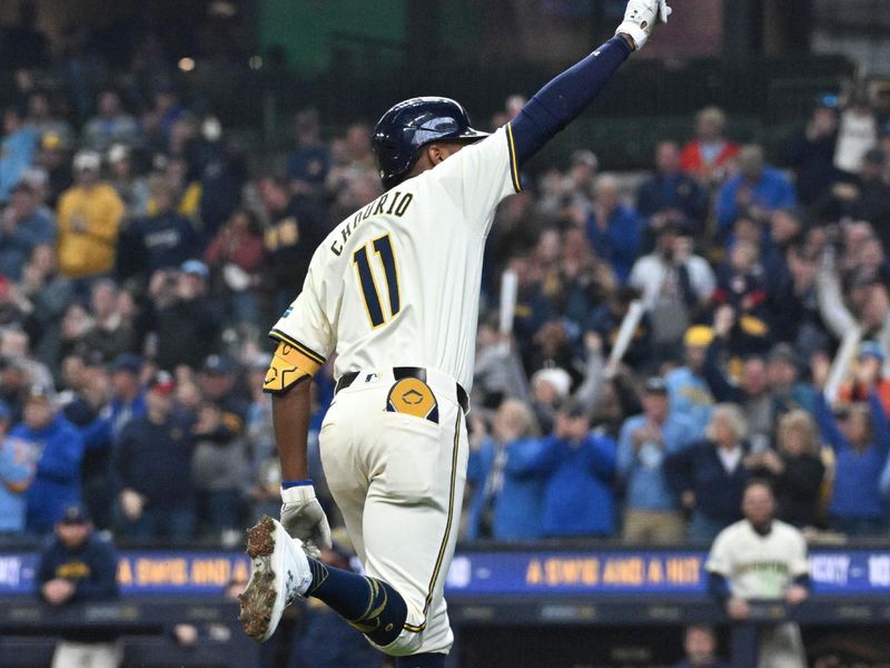 Apr 3, 2024; Milwaukee, Wisconsin, USA; Milwaukee Brewers right fielder Jackson Chourio (11) celebrates after hitting his first Major League home run against the Minnesota Twins in the fifth inning at American Family Field. Mandatory Credit: Michael McLoone-USA TODAY Sports