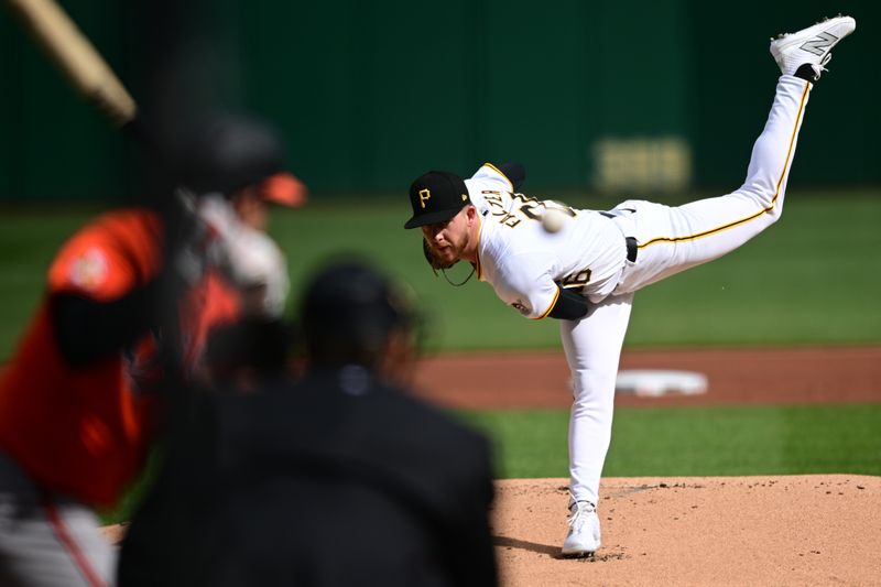 Apr 6, 2024; Pittsburgh, Pennsylvania, USA; Pittsburgh Pirates pitcher Bailey Falter (26) throws against Baltimore Orioles catcher Adley Rutschman (35) during the first inning at PNC Park. Mandatory Credit: David Dermer-USA TODAY Sports