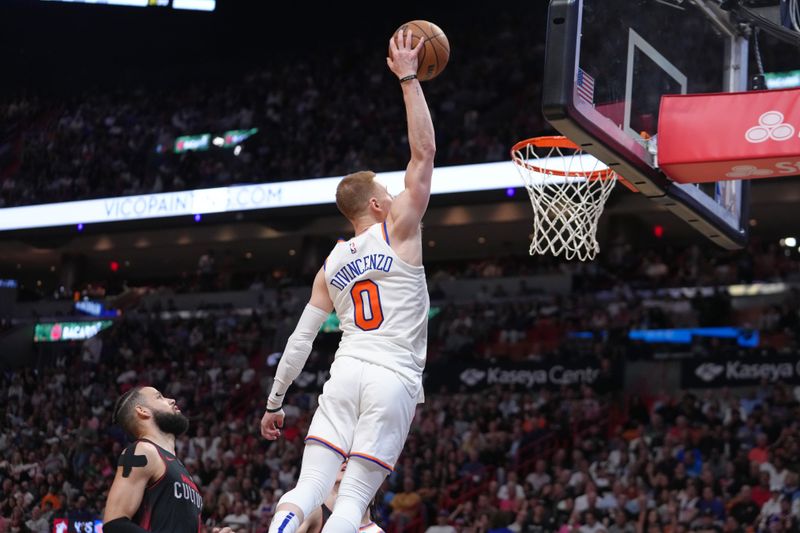 MIAMI, FL - APRIL 2: Donte Divincenzo #0 of the New York Knicks dunks the ball during the game against the Miami Heat on April 2, 2024 at Kaseya Center in Miami, Florida. NOTE TO USER: User expressly acknowledges and agrees that, by downloading and or using this Photograph, user is consenting to the terms and conditions of the Getty Images License Agreement. Mandatory Copyright Notice: Copyright 2024 NBAE (Photo by Eric Espada/NBAE via Getty Images)