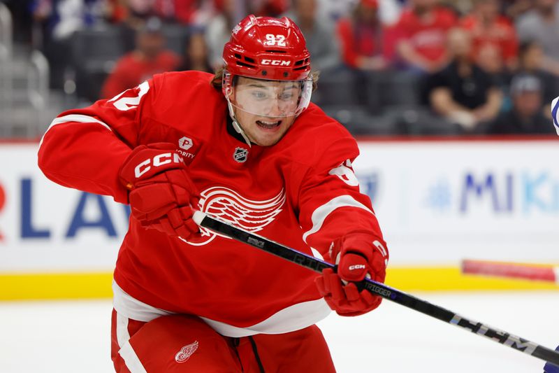 Oct 3, 2024; Detroit, Michigan, USA;  Detroit Red Wings center Marco Kasper (92) skates in the first period against the Toronto Maple Leafs at Little Caesars Arena. Mandatory Credit: Rick Osentoski-Imagn Images