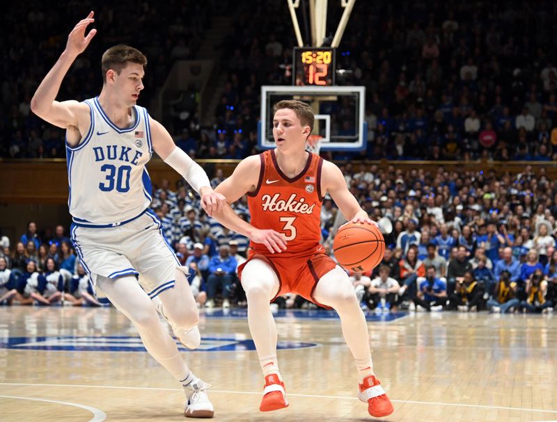 Feb 25, 2023; Durham, North Carolina, USA;  Virginia Tech Hokies guard Sean Pedulla (3) controls the ball in front of Duke Blue Devils center Kyle Filipowski (30) during the first half at Cameron Indoor Stadium. Mandatory Credit: Rob Kinnan-USA TODAY Sports