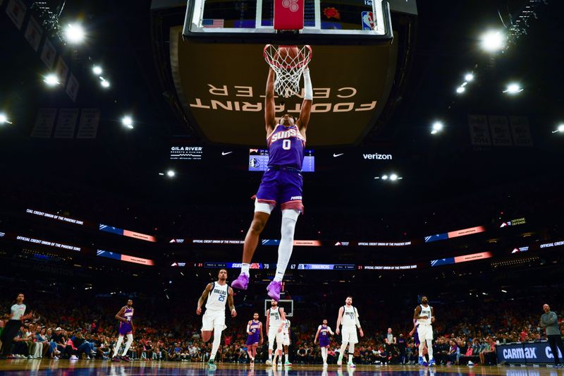 PHOENIX, AZ - OCTOBER 26: Ryan Dunn #0 of the Phoenix Suns dunks the ball during the game against the Dallas Mavericks on October 26, 2024 at Footprint Center in Phoenix, Arizona. NOTE TO USER: User expressly acknowledges and agrees that, by downloading and or using this photograph, user is consenting to the terms and conditions of the Getty Images License Agreement. Mandatory Copyright Notice: Copyright 2024 NBAE (Photo by Barry Gossage/NBAE via Getty Images)