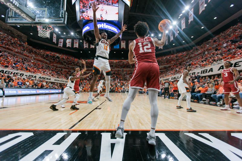 Feb 24, 2024; Stillwater, Oklahoma, USA; Oklahoma State Cowboys guard Javon Small (12) inbounds the ball by Oklahoma State Cowboys guard Javon Small (12) during the second half at Gallagher-Iba Arena. Mandatory Credit: William Purnell-USA TODAY Sports