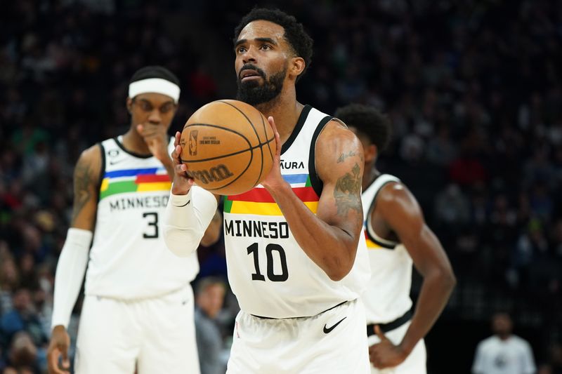 MINNEAPOLIS, MN -  APRIL 2: Mike Conley #10 of the Minnesota Timberwolves shoots a free throw during the game against the Portland Trail Blazers on April 2, 2023 at Target Center in Minneapolis, Minnesota. NOTE TO USER: User expressly acknowledges and agrees that, by downloading and or using this Photograph, user is consenting to the terms and conditions of the Getty Images License Agreement. Mandatory Copyright Notice: Copyright 2023 NBAE (Photo by Jordan Johnson/NBAE via Getty Images)