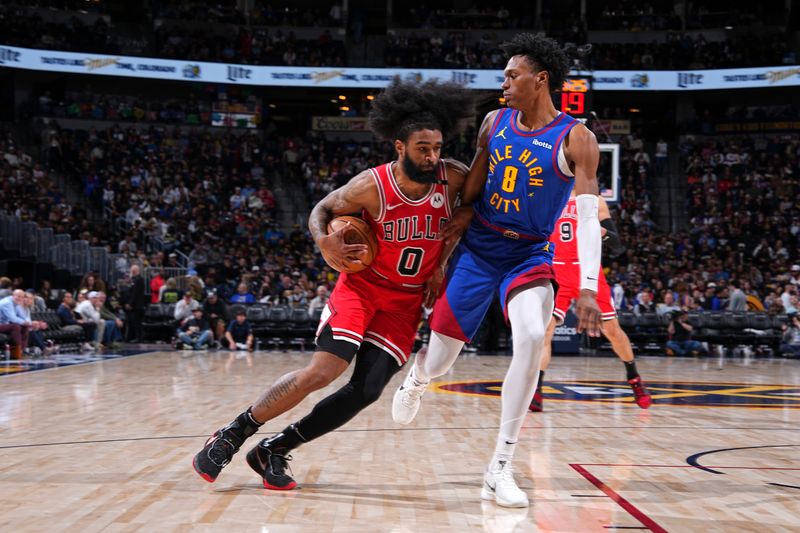 DENVER, CO - MARCH 24: Coby White #0 of the Chicago Bulls handles the ball during the game against the Denver Nuggets on March 24, 2025 at Ball Arena in Denver, Colorado. NOTE TO USER: User expressly acknowledges and agrees that, by downloading and/or using this Photograph, user is consenting to the terms and conditions of the Getty Images License Agreement. Mandatory Copyright Notice: Copyright 2025 NBAE(Photo by Bart Young/NBAE via Getty Images)